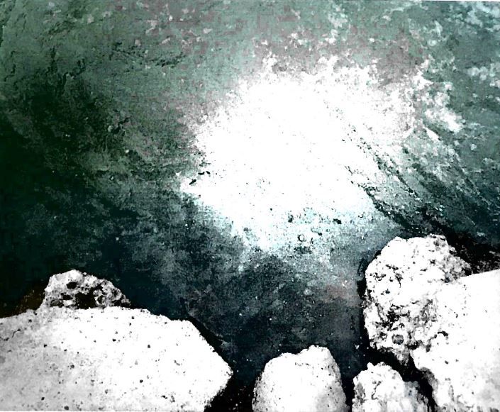 Plastic pellets float in the Victoria barge Canal